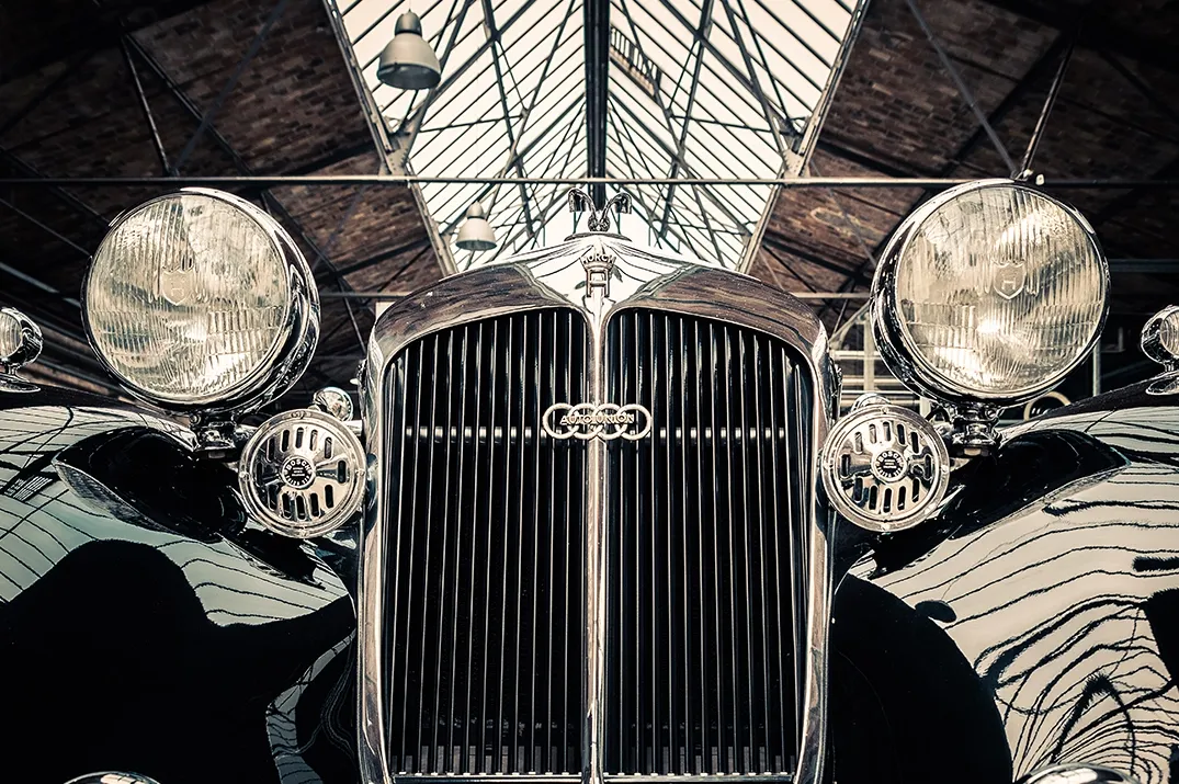 What are the 4 companies of Audi